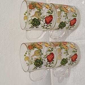 Vintage set of four Arcoroc France clear mugs w/ vegetable design.